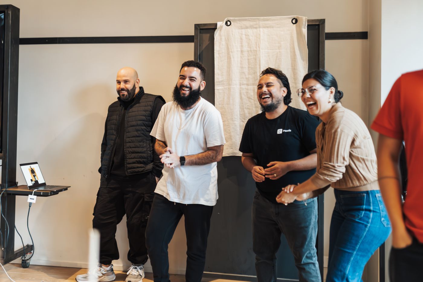 Stock photograph of friends sharing a laugh