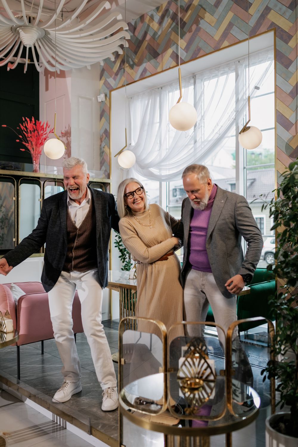Stock photograph of older friends enjoying a party