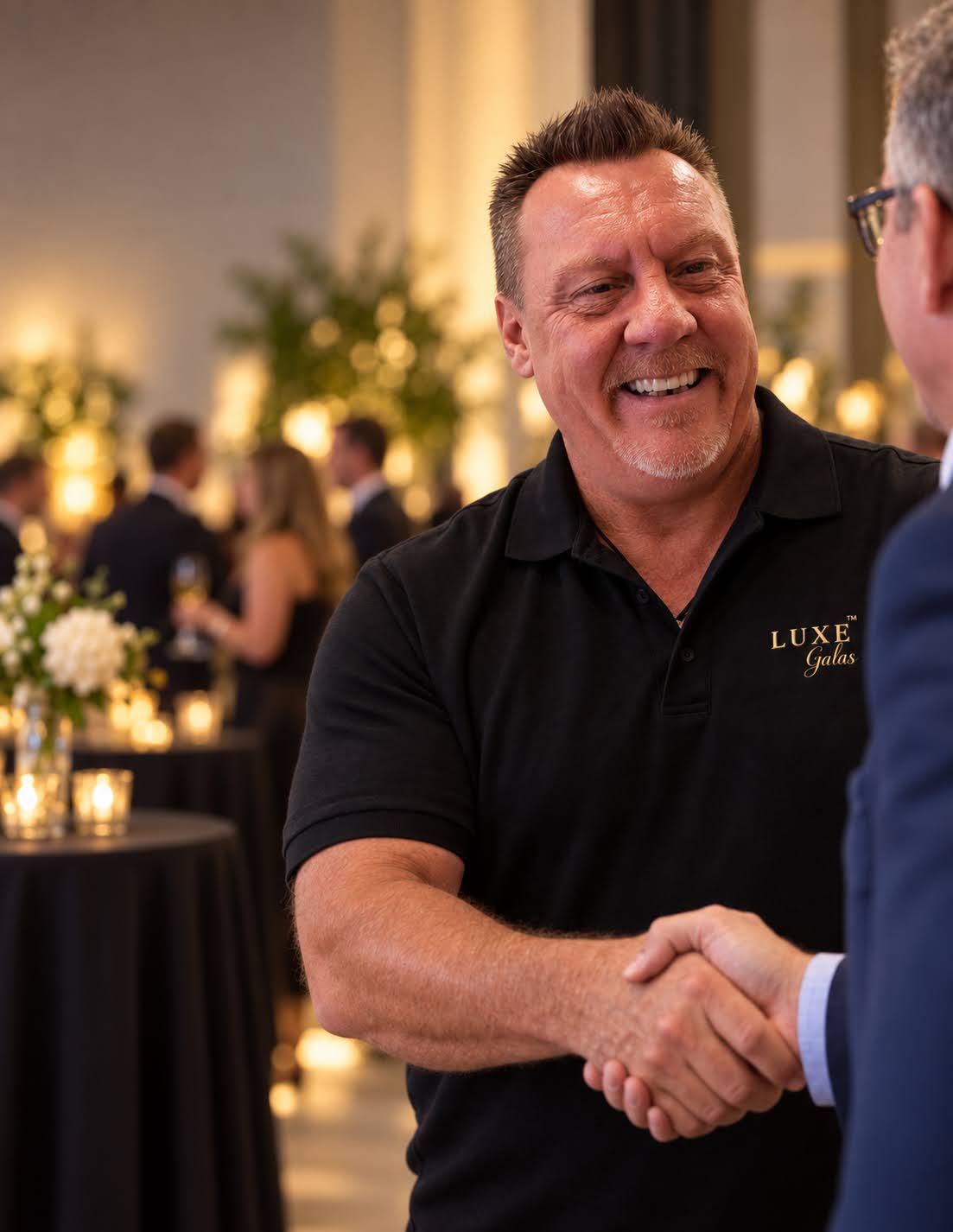 A warm welcome and handshake in a Luxe Galas shirt